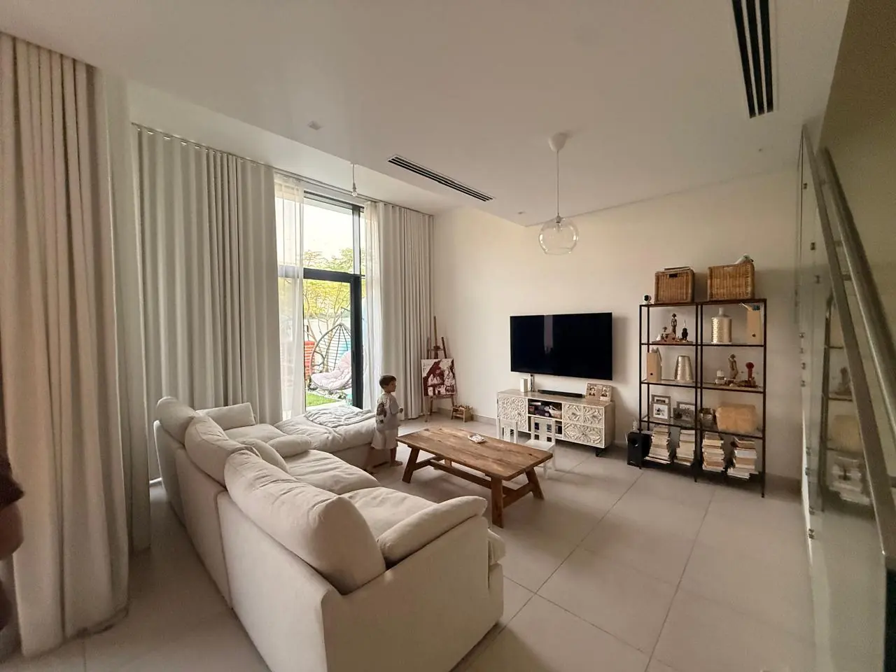 The lived-in townhouse: Photo 13, shot on the agent's phone