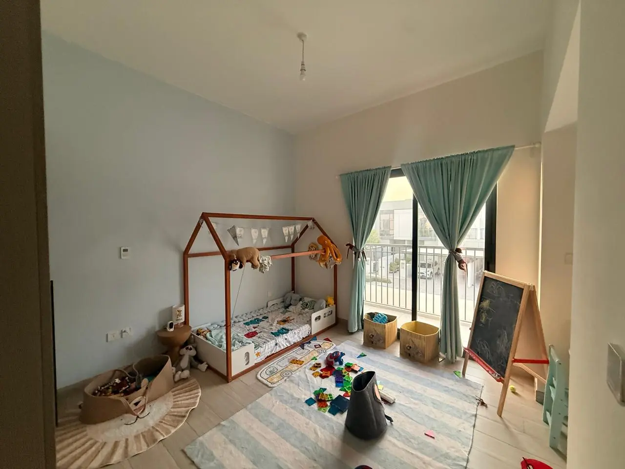 The lived-in townhouse: Photo 15, shot on the agent's phone
